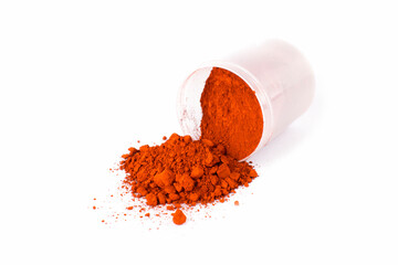 English Red. Bright Red Spice Heaped on a Clean Surface With a Scoop Showing Texture and Color...