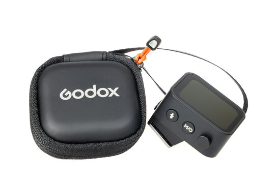 Varna , Bulgaria - DECEMBER 27, 2025-Godox X3 TTL Wireless Flash Trigger with Protective Case on White Background, Modern Photography Lighting Accessory for Studio and On-Camera Flash Control