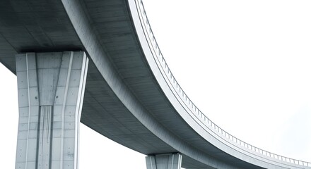 Fototapeta premium Curving Elevated Highway Structure Under Bright Sky With Concrete Pillars