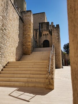 Stone staircase leading to the entrance of the medieval Castellet Castle.