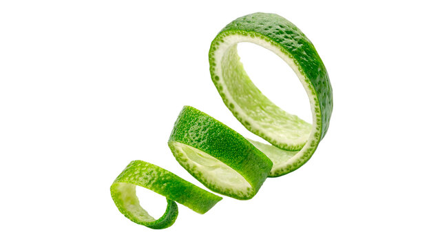 Lime peel being cut into spirals in kitchen during preparation of food for a meal
