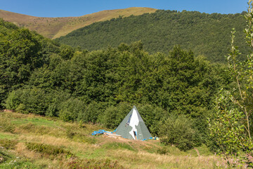 Wigwam on Summer Meadow in Borzhava Valley, Carpathians © Alla