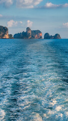 Tropical paradise of Railay Beach in Phuket with limestone cliffs and crystal waters