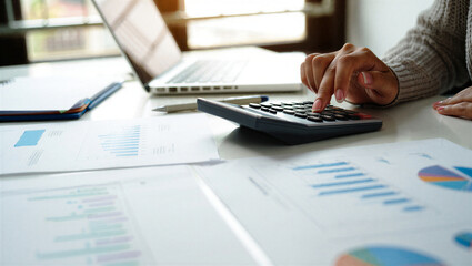 Fototapeta premium businessman working on a calculator