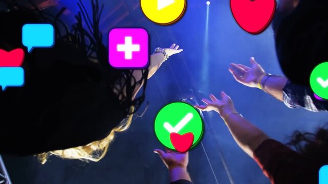 Music audience reaching under disco ball, light cues causing reaction icons multiplying over hands