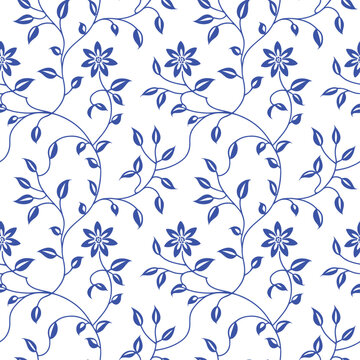 Blue floral seamless pattern with elegant vine leaves and blooming flowers on transparent background for textile or wallpaper design
