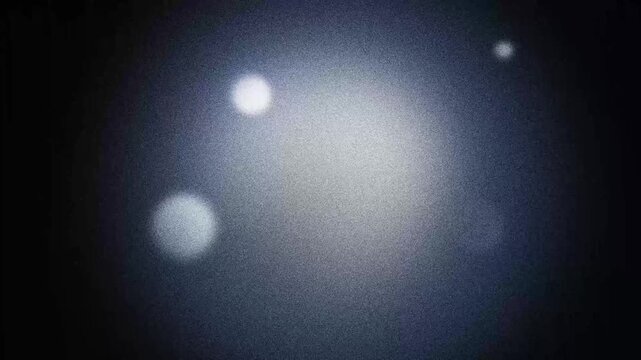 Digital noise blurry gradient ghost planets . Monochrome texture. Abstract grunge animated background. Black and white, gray, deep blue, beige pastel looping animation