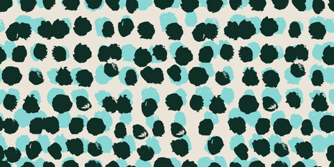 Obraz premium A seamless vector pattern of abstract organic blobs in deep forest green and soft turquoise on warm cream background