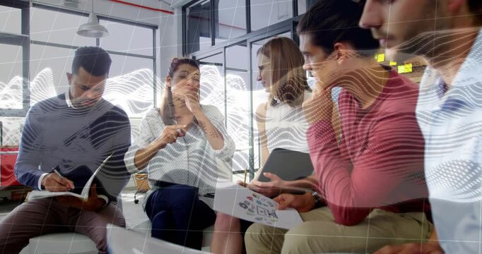 Team business meeting reviewing reports, speaker starting, scribe writing, grid overlay moving