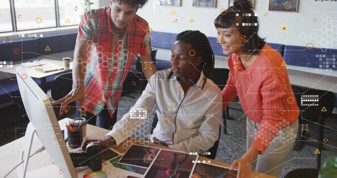 Design team reviewing prints screen seated lead clicking mouse showing hex overlay finalizing pick