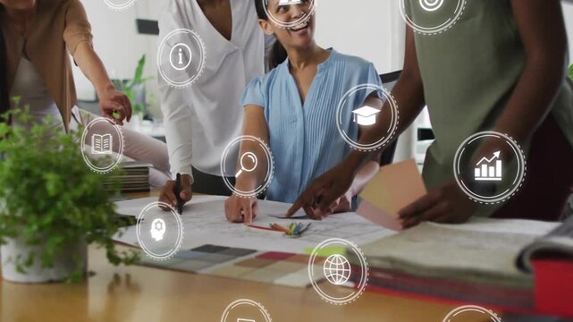 Three women pointing and sorting swatches in design while digital icons appearing narrowing options