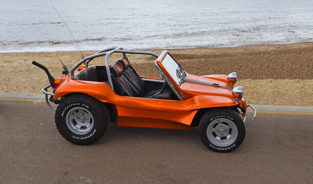 Classic Volkswagen Prowler Dune Buggy with beach and sea in background