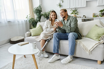 Fototapeta premium Two friends enjoying a joyful moment in a cozy modern apartment together