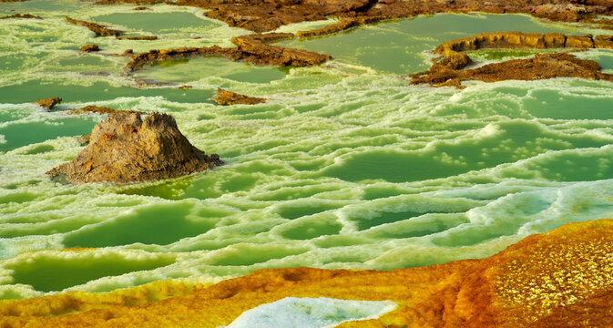 Green mineral pools and salt ridges in Dallol geothermal field, Ethiopia