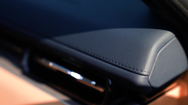 A close-up of the dashboard stitching in a premium car