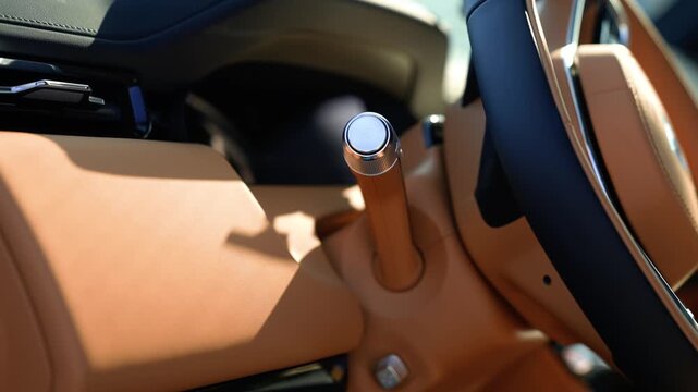Metal turn signal control lever in a car