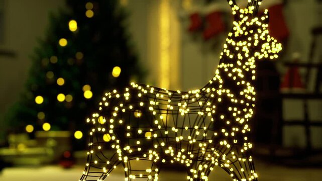 Warm shimmering scene of decorated holiday reindeer. Enchanting tableau with softly lit reindeer silhouette and twinkling holiday decorations in background