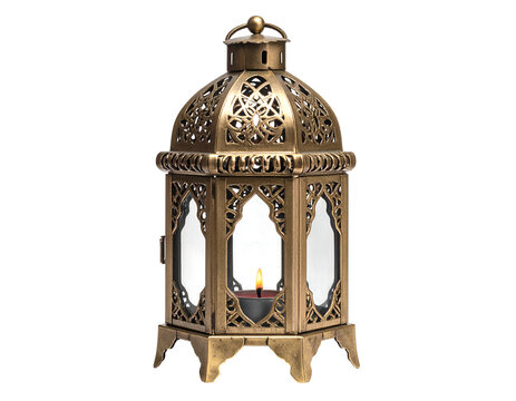 Ornate brass lantern with intricate openwork and burning candle