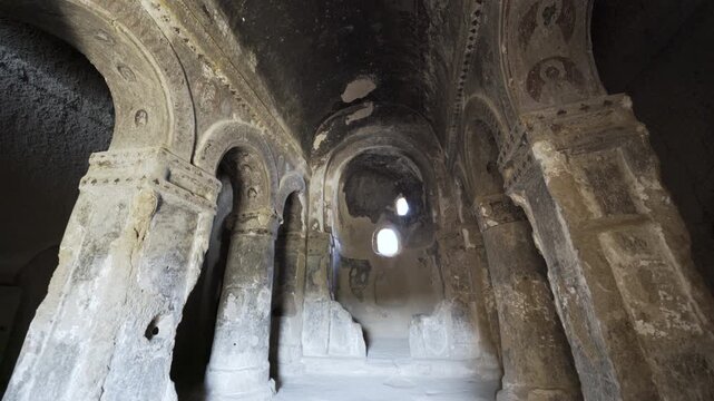 Cinematic shot of historic cave churches at Selime Castle in Cappadocia, Turkey