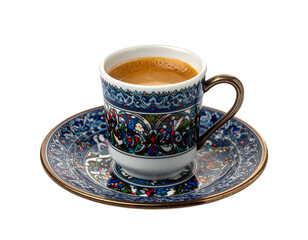 Fototapeta premium Ornate blue cup and saucer filled with rich, foamy coffee