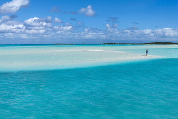 Fototapeta premium Woman Gazing on Sandbar Exumas