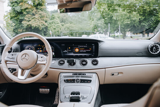 OLAND, ELBLAG, 23 JULY 2024 - Interior of a black Mercedes-Benz CLS (C257) luxury four-door coupe with dashboard, steering wheel and infotainment screen