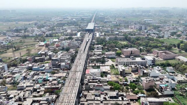 Aerial 4k view of RRTS Namo Bharat Train Running in Meerut, Uttar Pradesh, India