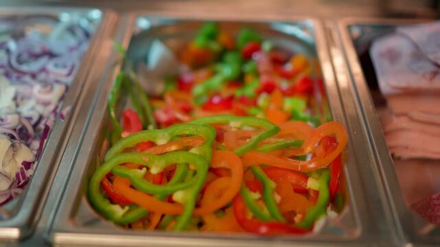 chopped Fresh vegetables, meat, chease in the refrigerator of the restaurant