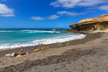Rock formations and caves on the Atlantic Ocean coast in Ajuy, Fuerteventura, wallpaper or background for your project © anettastar
