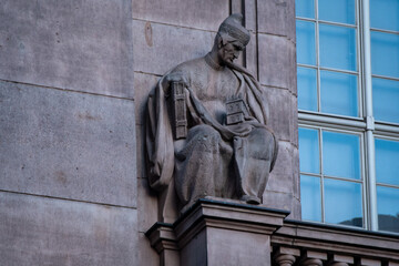 Fototapeta premium Stone sculpture at the Staatsbibliothek Unter den Linden in Berlin, located at Dorotheenstraße and Charlottenstraße