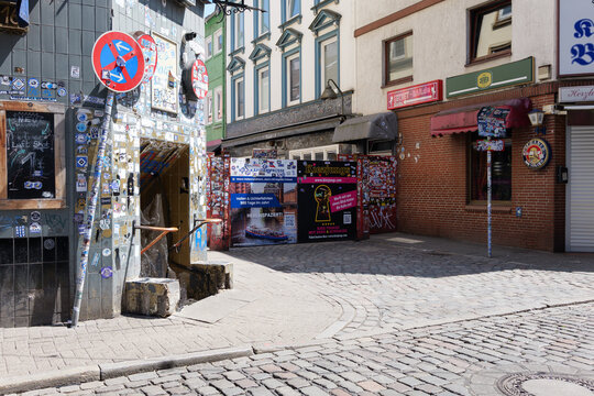 HAMBURG, GERMANY - 12. June 2025: Herbertstrasse entrance gate exterior. A barrier obstructs the view into the street. Red-light district of St. Pauli and famous travel destination for many tourists.