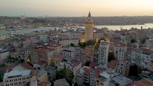 Cinematic aerial shot of Galata Tower at sunset in Istanbul, Turkey