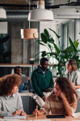 Diverse business team collaborating in modern coworking office