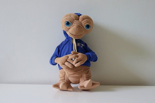 Salvador, Brazil - March 18, 2026: Alien ET plush toy on white background. E.T. plush toy from the Universal Pictures movie. E.T. the Extra-Terrestrial. 