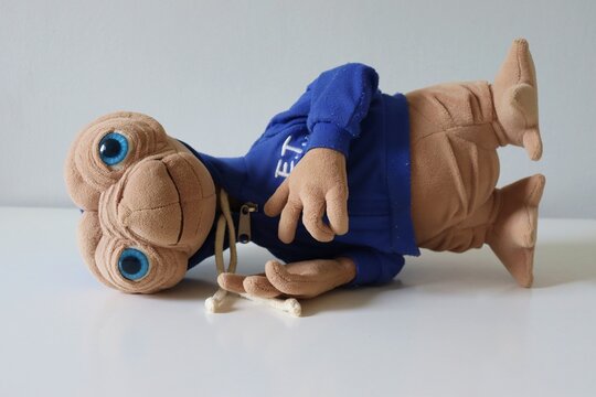 Salvador, Brazil - March 18, 2026: Alien ET plush toy on white background. E.T. plush toy from the Universal Pictures movie. E.T. the Extra-Terrestrial. 