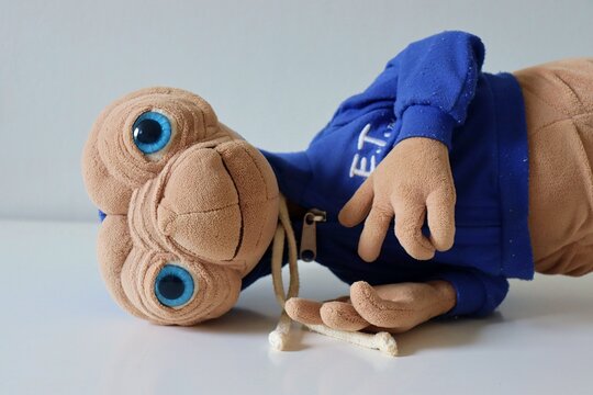 Salvador, Brazil - March 18, 2026: Alien ET plush toy on white background. E.T. plush toy from the Universal Pictures movie. E.T. the Extra-Terrestrial. 