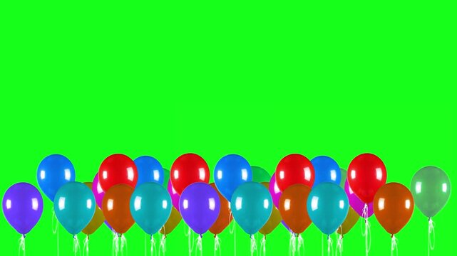A vibrant collection of red, blue, and multicolored balloons forms a lower border and floats upward against a green screen. Excellent for use as a festive frame or transition in party videos.