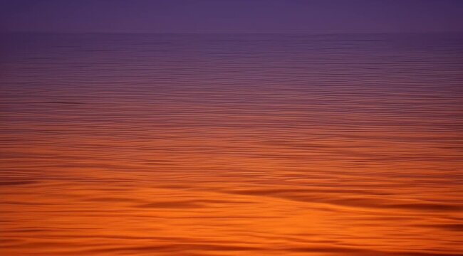 Abstract sunset water ripples with a gradient from purple to vibrant orange hues