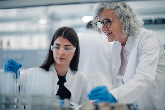 Women scientists working on research experiment in laboratory