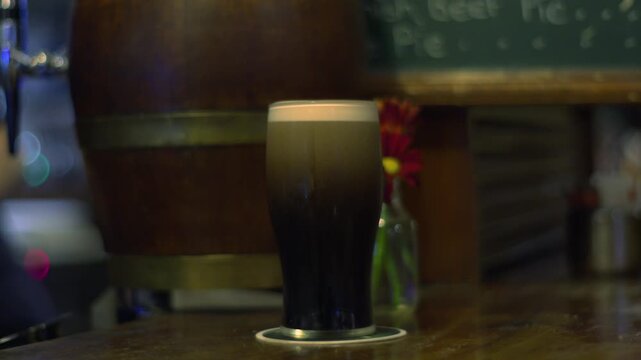 Pint glass of porter stout black beer traditional Irish alcohol drink