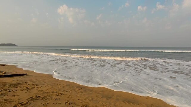Golden Hour at Agonda Beach with Wooden Canoes and Crashing Waves, South Goa, India