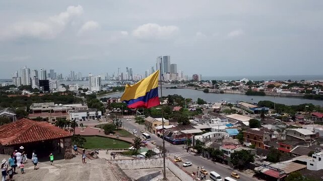 aerial view of colombian flag waving over cartagena fortress