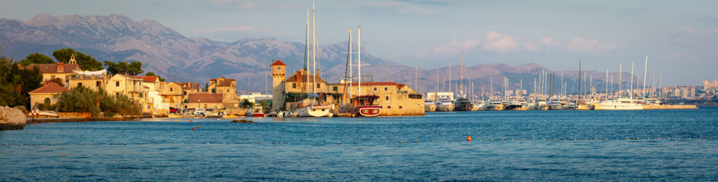 Croatia Kastel Gomilica Ultra High Resolution 14K Panorama at Sunset with Luxury Yachts and Medieval Kastilac Fortress in Sea Game of Thrones Braavos Filming Location Mountains Background. Fine art 
