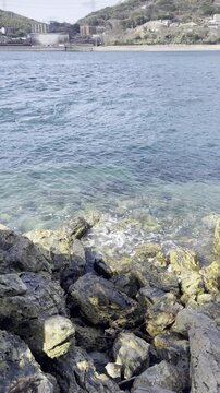 Clear Blue Waves on Rocky Kanmon Shore