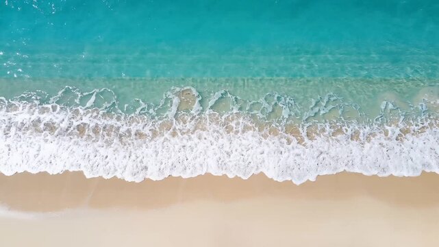 Ocean waves, gentle lapping on sandy beach, aerial view, turquoise water, symbolizing serenity and tranquility