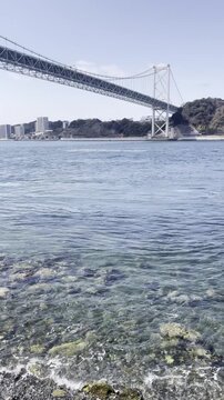 Kanmon Bridge and Calm Blue Strait Water