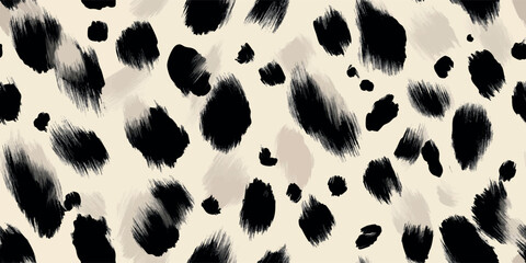 Hand drawn black ink leopard spots, polka dot on beige background for design, textiles, packaging, fabrics, and home decor wallpapers © Eli Berr