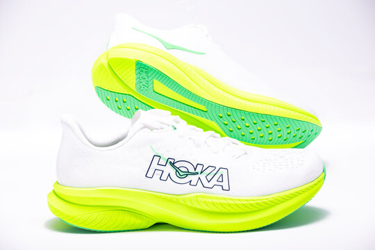 HOKA Running Shoes Pair with Neon Yellow Sole &ndash; Modern Performance Running Footwear Studio Shot, Illustrative Editorial