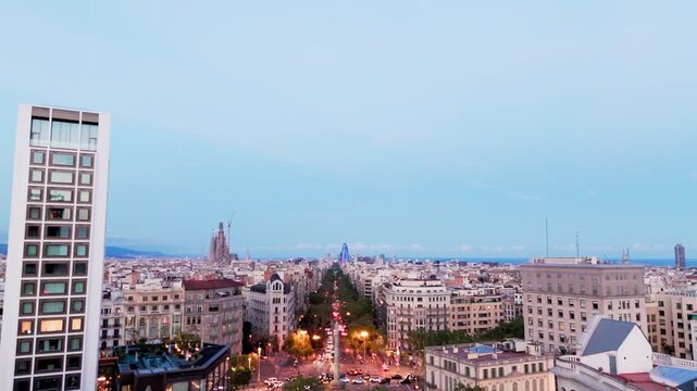 Aerial drone view of barcelona skyline at dusk