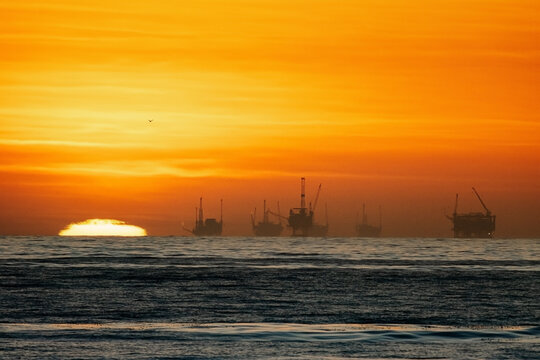 Sunset on offshore oil platforms on the coast of Santa Barbara, California